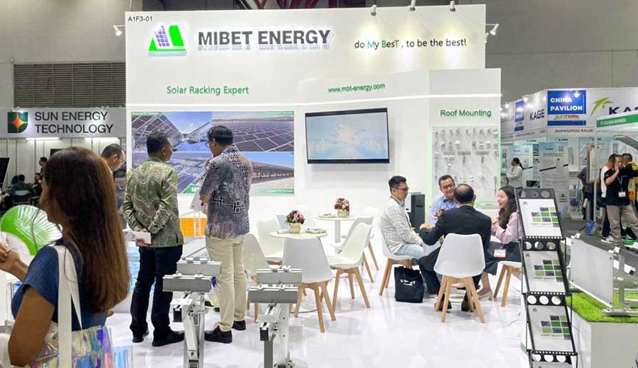 Visitors to the Mibet booth learn about the products
